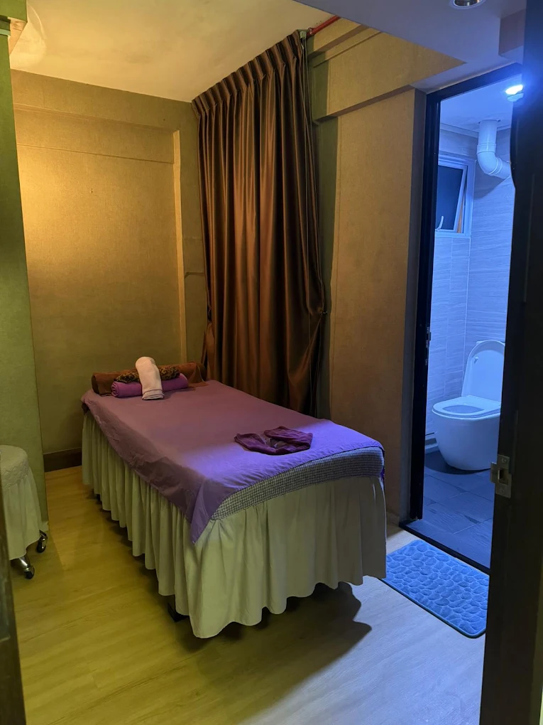 Private massage treatment room with an ensuite bathroom